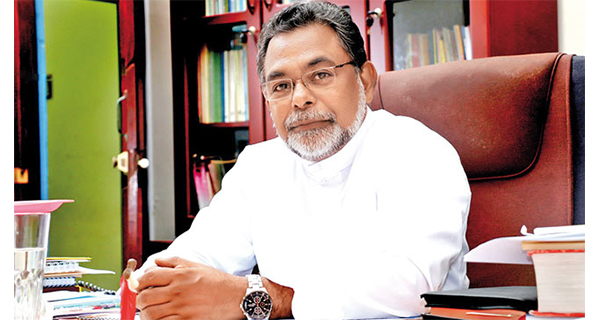 Father Cyril Gamini summoned to CID