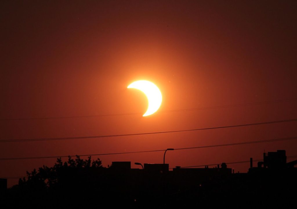 A partial solar eclipse will be visible in many parts of Sri Lanka tomorrow