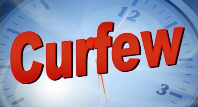 A notice from the police about using the road during the curfew period